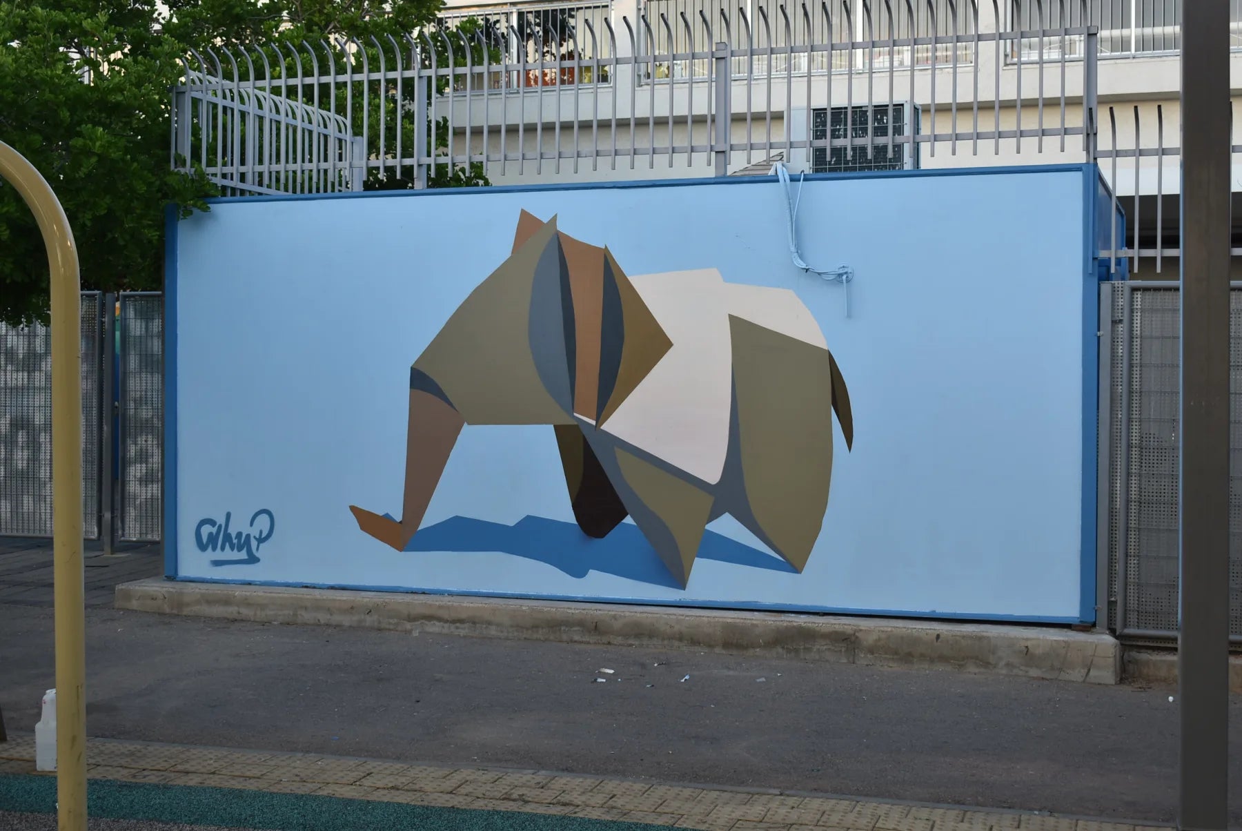Geometric ram mural on a blue wall